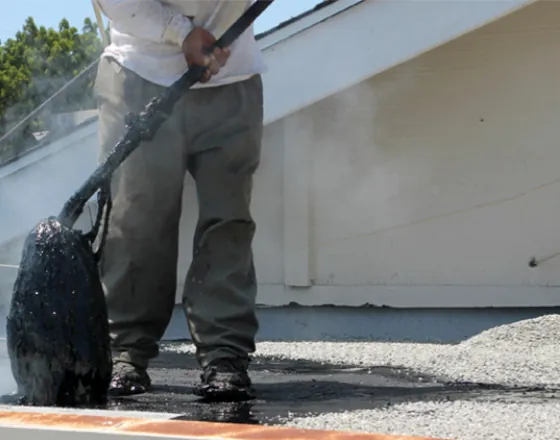 roof hot mopping a flat roof