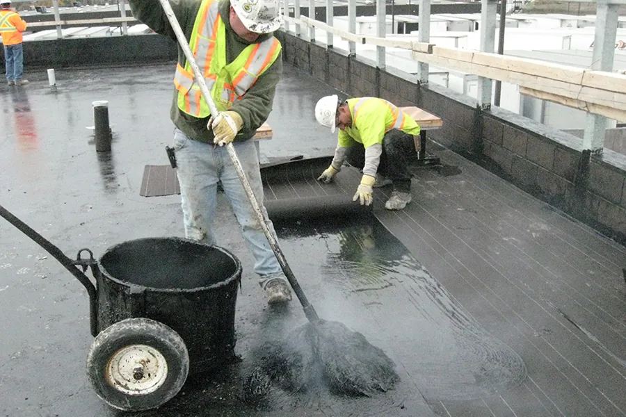 BUR application by roofers