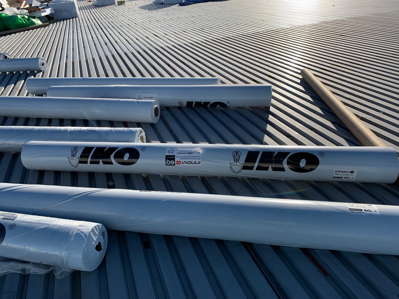 TPO membrane rolls on a commercial roof