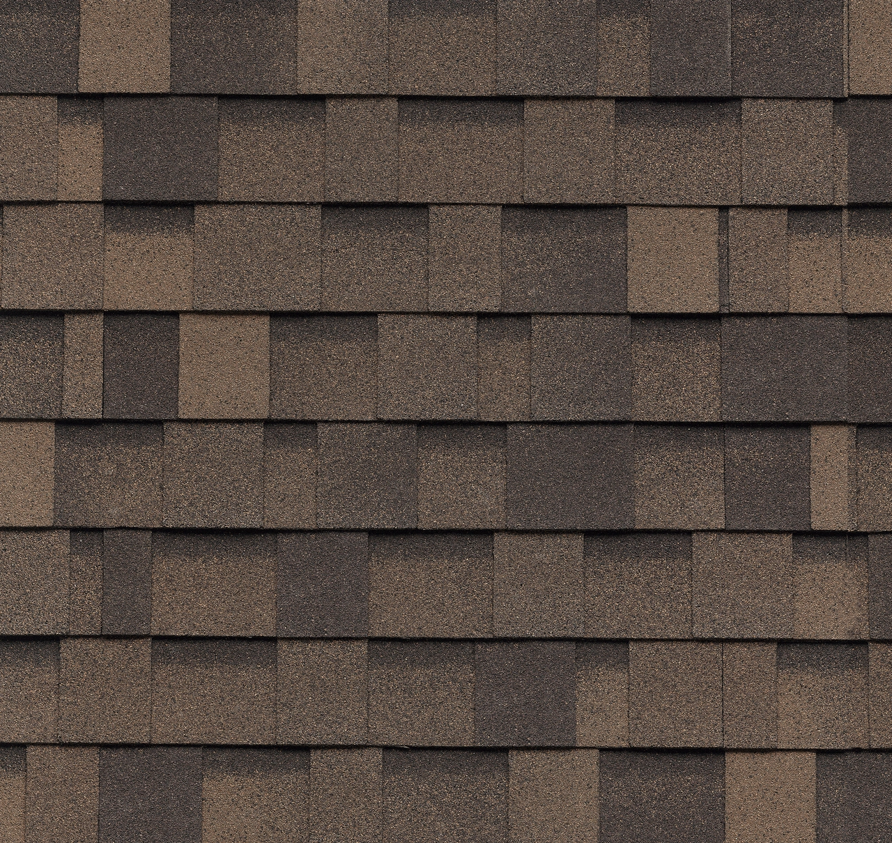 Close-up of a Dynasty Shadow Brown asphalt shingle roof, showcasing a uniform pattern of overlapping rectangular tiles.