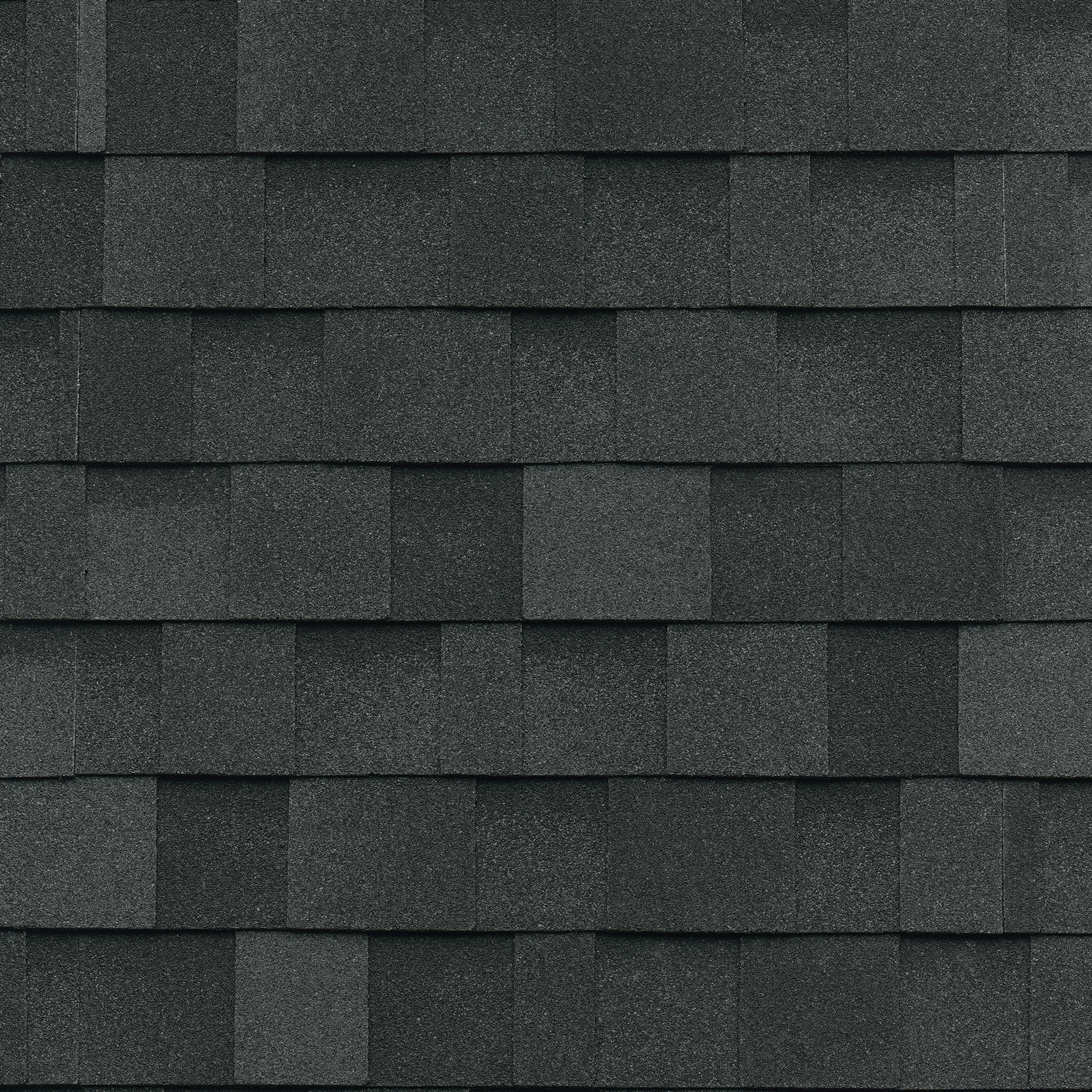 Cambridge gray asphalt roof shingles arranged in an overlapping pattern add a touch of elegance to your home.