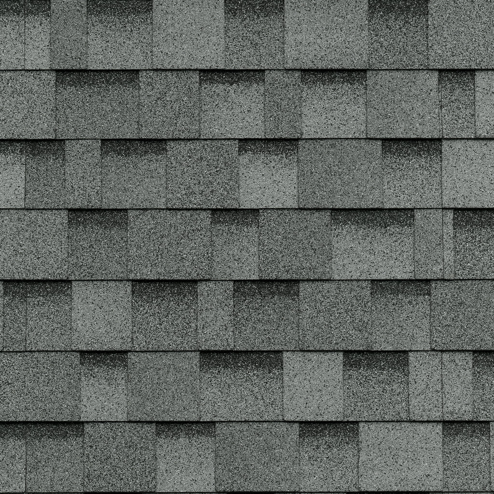 Close-up of Dual Grey asphalt roof shingles with a rectangular pattern, reminiscent of the classic Cambridge style.