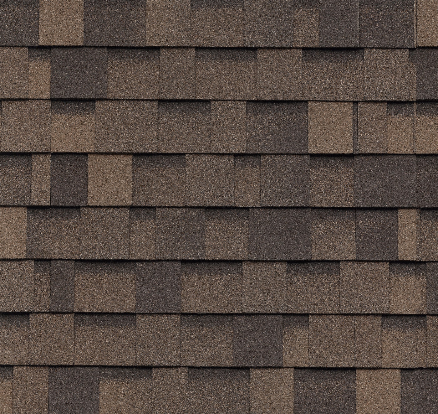 Close-up of Nordic Shadow Brown asphalt roof shingles arranged in a repetitive pattern.