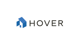 Logo with a blue geometric shape resembling a house next to the word 