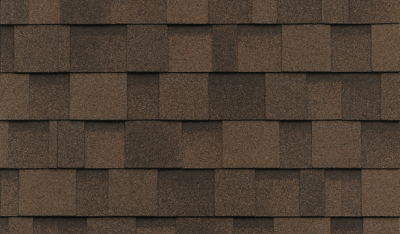 Cambridge Dual Brown asphalt shingles are expertly arranged in a uniform pattern on the roof.