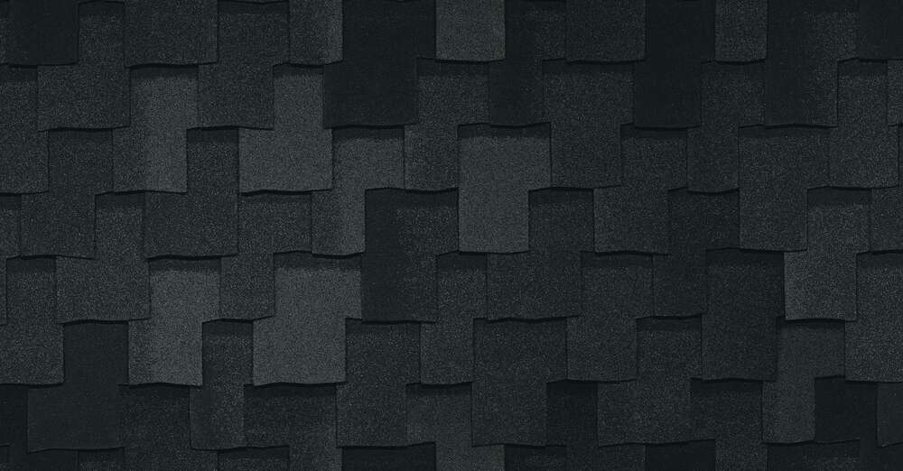 Close-up of layered Armourshake shingles in Shadow Black, showcasing a textured, overlapping pattern.