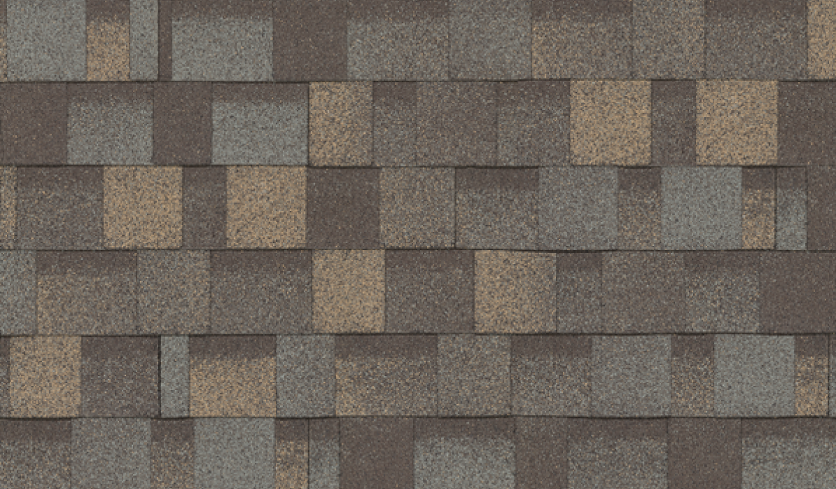 Close-up of a roof with overlapping asphalt shingles, featuring a Nordic-inspired pattern of alternating shades of brown and gray Weatherwood.