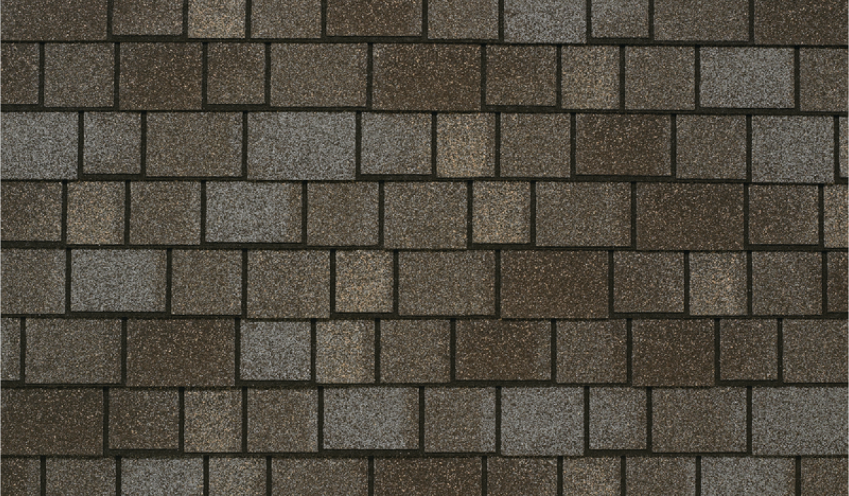 Close-up of a roof with overlapping rectangular asphalt shingles in shades of brown and gray, reminiscent of Royal Estate's classic charm, arranged in a uniform pattern.