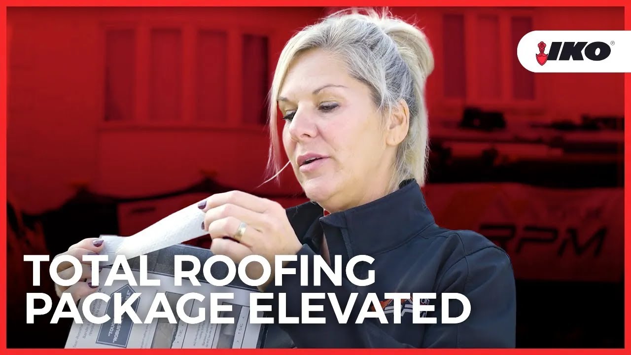 A woman examines a roofing product sample, with banners and text reading "Total Roofing Package Elevated" next to the brand logo of Toiture RPM. A closer look reveals it's the IKO Dynasty Shingle, highlighting exceptional quality in roofing solutions.