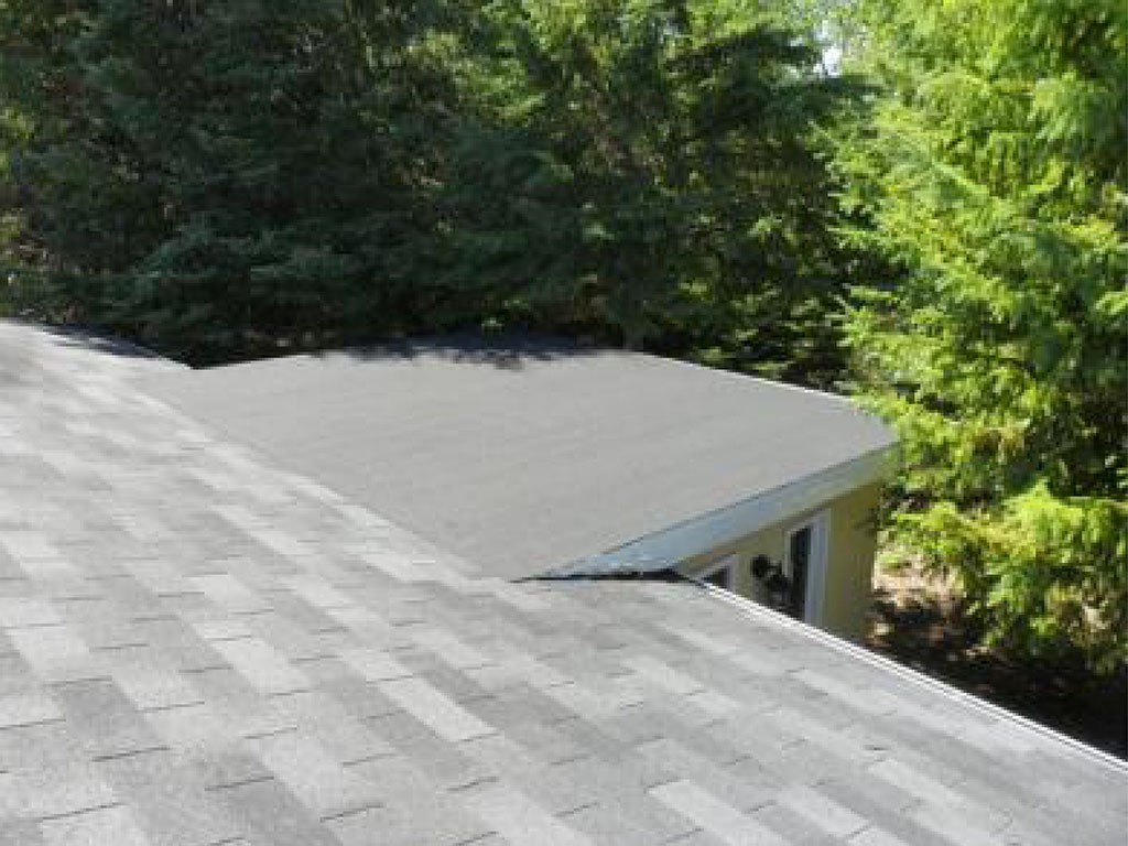 How to Tie in a Flat Roof With a Shingle Roof - IKO